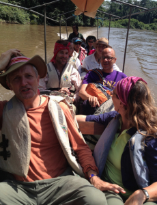 Above:  Our large, motorized canoe carried us upstream. 